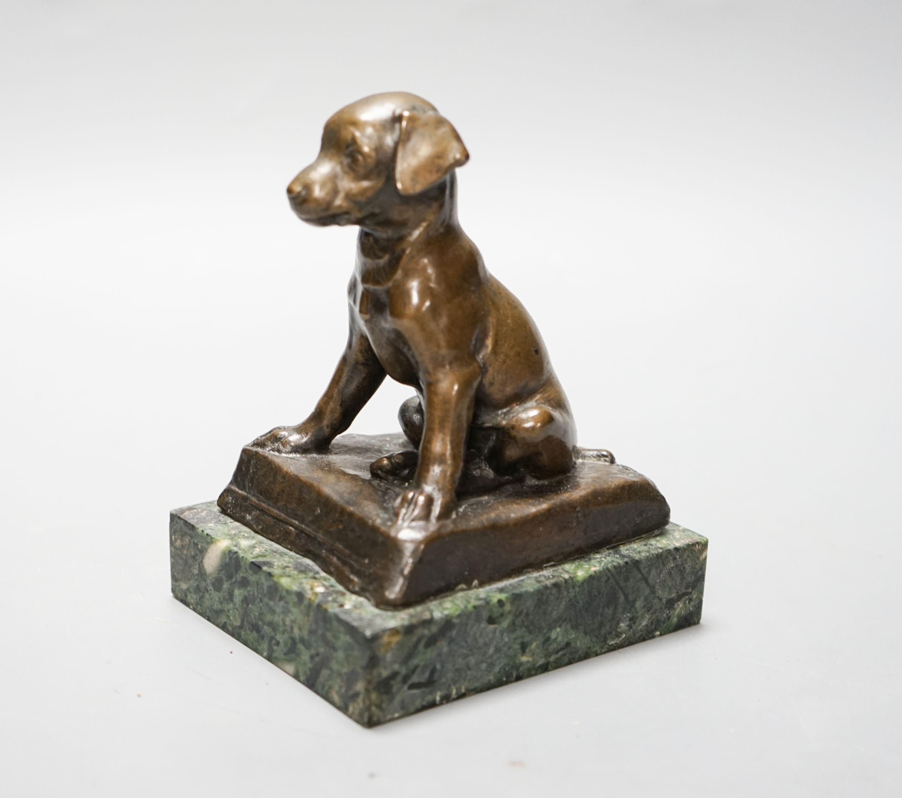 An early 20th century bronze figure of a seated puppy, 13cm